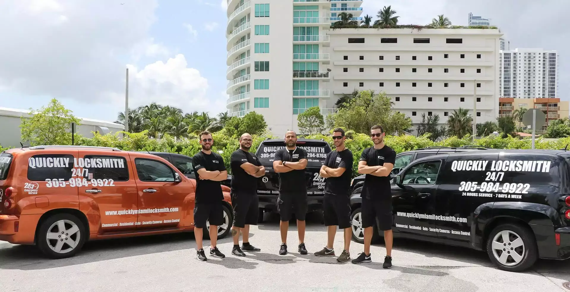 Quickly Locksmith team outside their cars